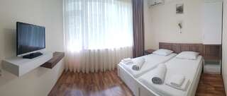 Отель Отель Капитан Гонио Стандартный двухместный номер с 2 двуспальными кроватями-1
